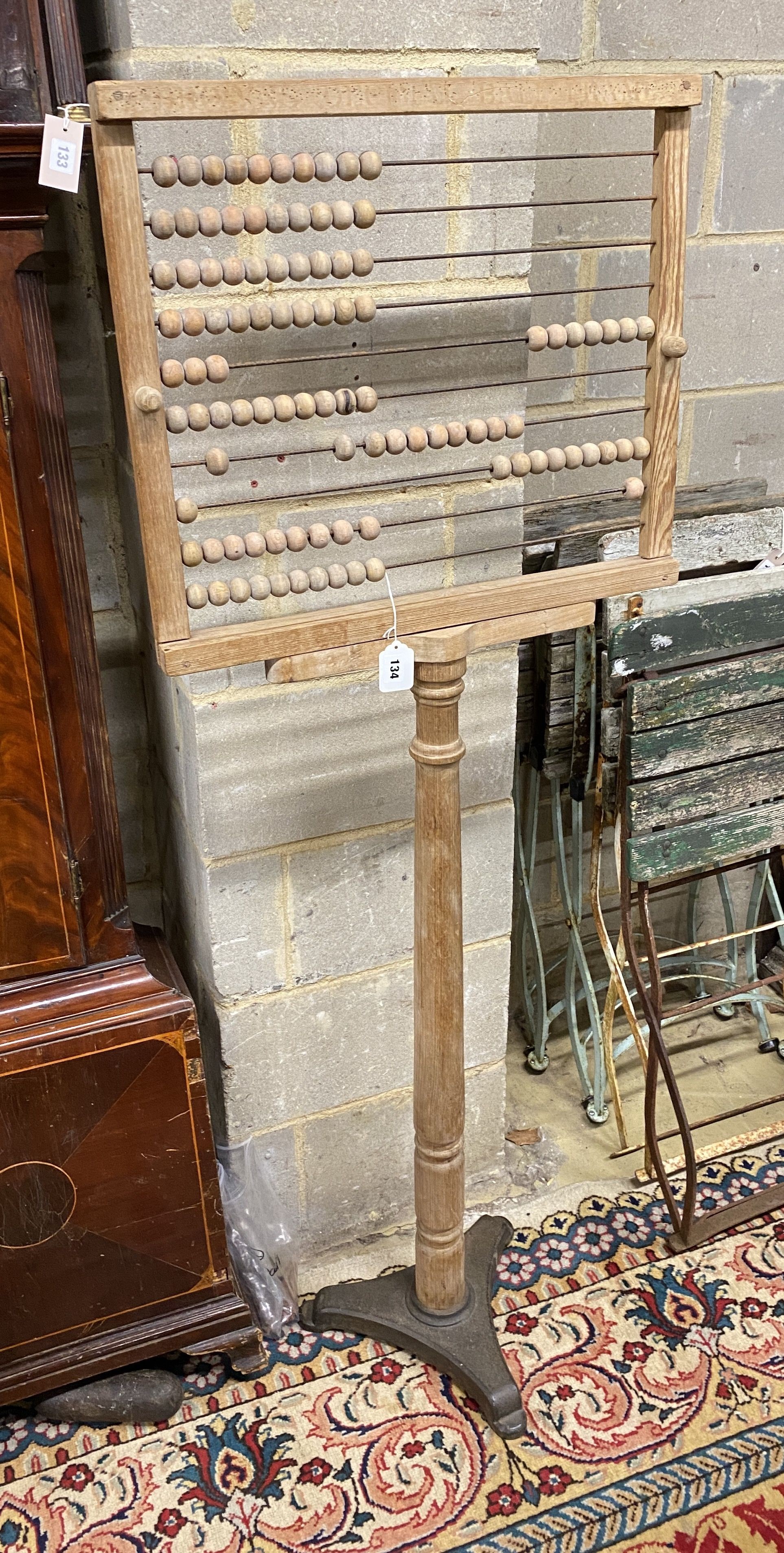 A Brown's decimal ball frame abacus, height 115cm